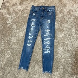 American Eagle Ripped Ne(x)t level stretch blue jeans.  Size 2